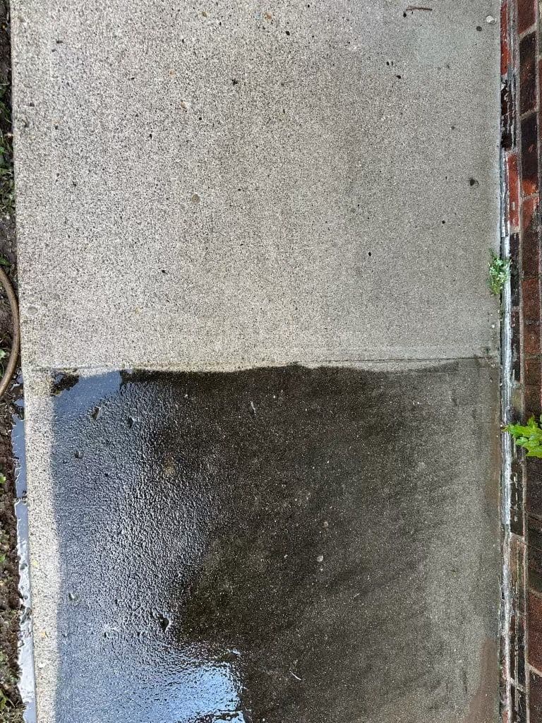 Clean and dirty concrete sidewalk showing contrast after pressure washing.
